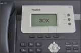Cómo Hacer una Llamada en Conferencia Usando Yealink T21 / T22 / T26